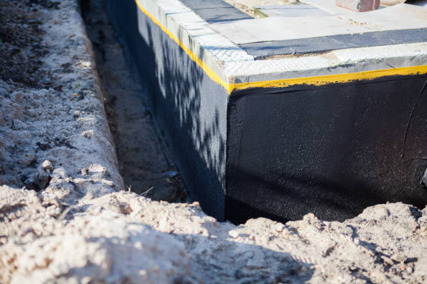 Professional Waterproofing technician working in Scottsville, KY